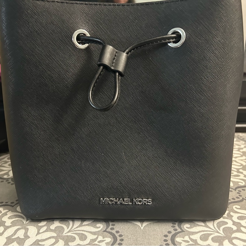 Michael Kors pocketbook, used once, black, small. Great for everyday use.